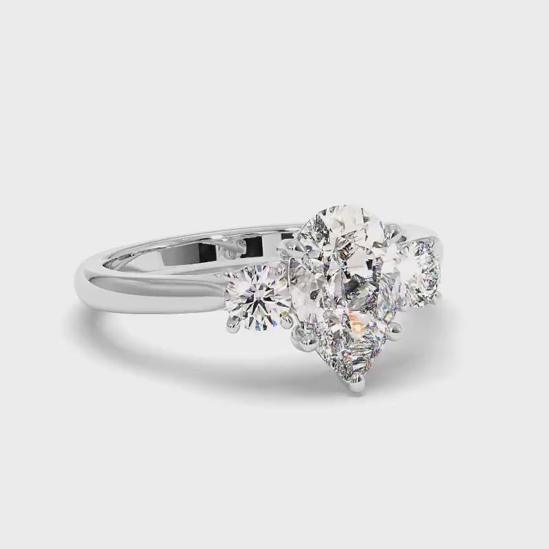 0.95-3.45 CT Round & Pear Cut Lab Grown Diamonds - Three Stone Ring