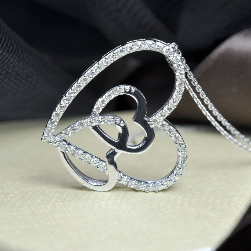 0.55 CT Round Cut Natural Diamonds - Heart Pendants