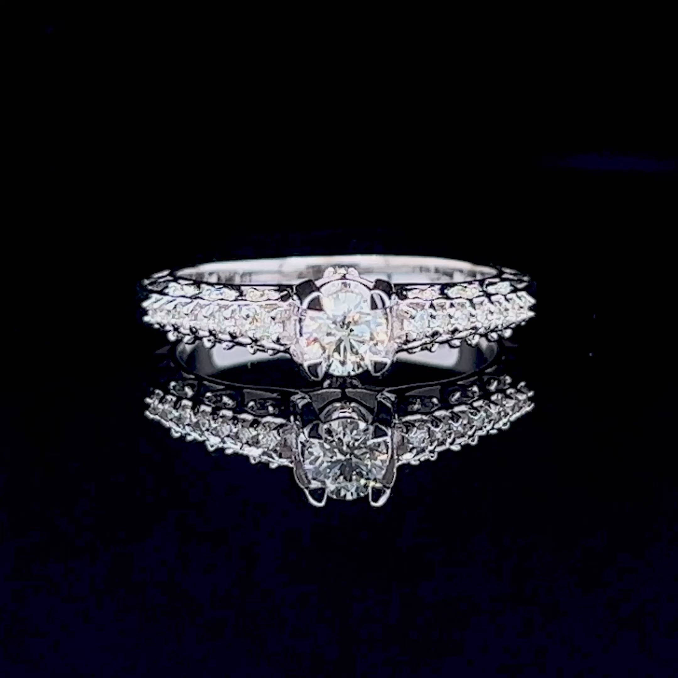 Affordable 0.60 CT Round Cut Diamond Engagement Ring in 14KT White Gold