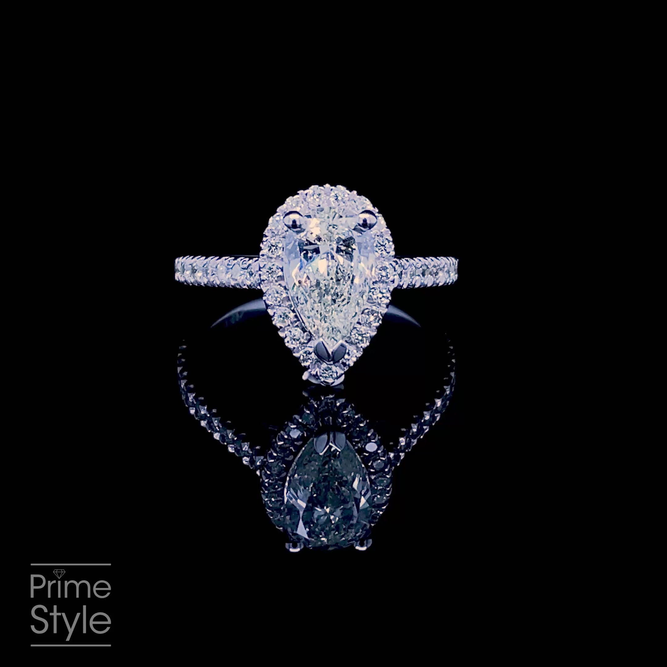 Radiant 1.25CT Pear and Round Cut Diamond Engagement Ring in 14KT White Gold