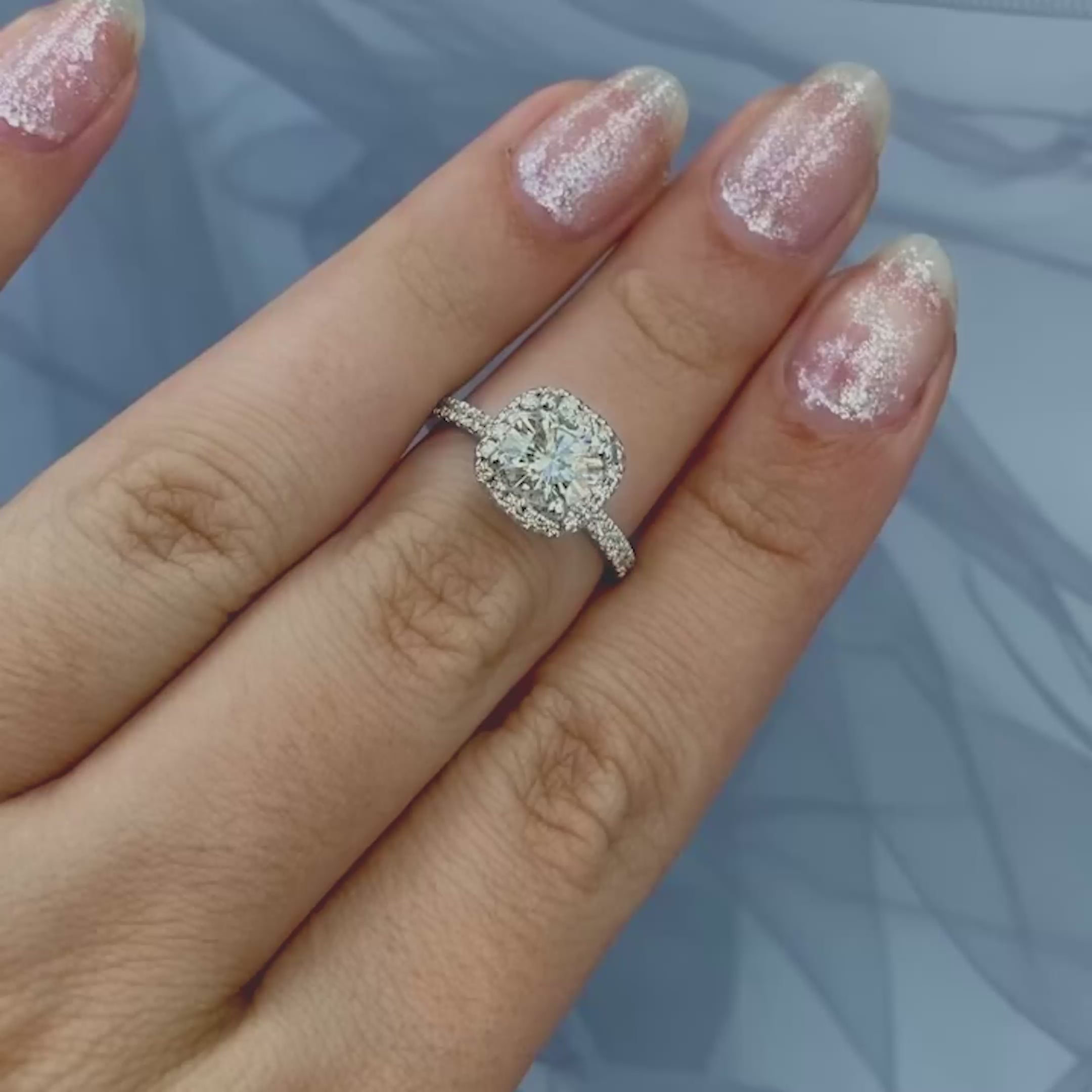 Distinctive 1.40 CT Round Cut Diamond Engagement Ring in 14 KT White Gold