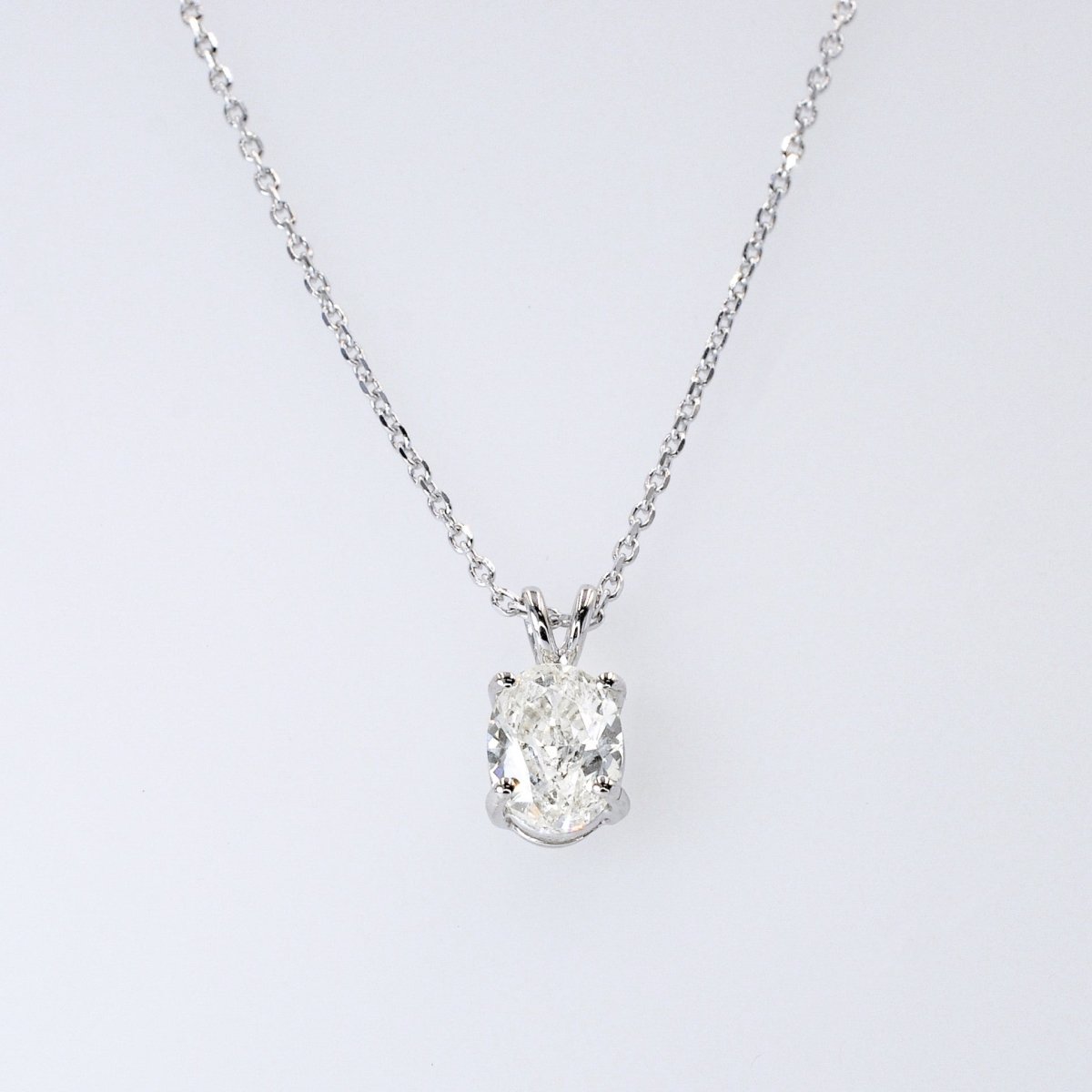 Affordable 1.50CT Oval Cut Diamond Solitaire Pendant in 14KT White Gold