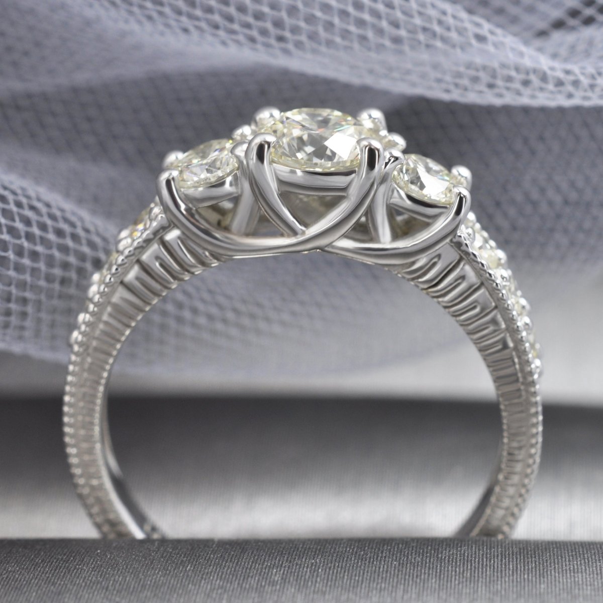 Certified 1.55 CT Round Cut Diamond Three Stone Ring in 14 KT White Gold