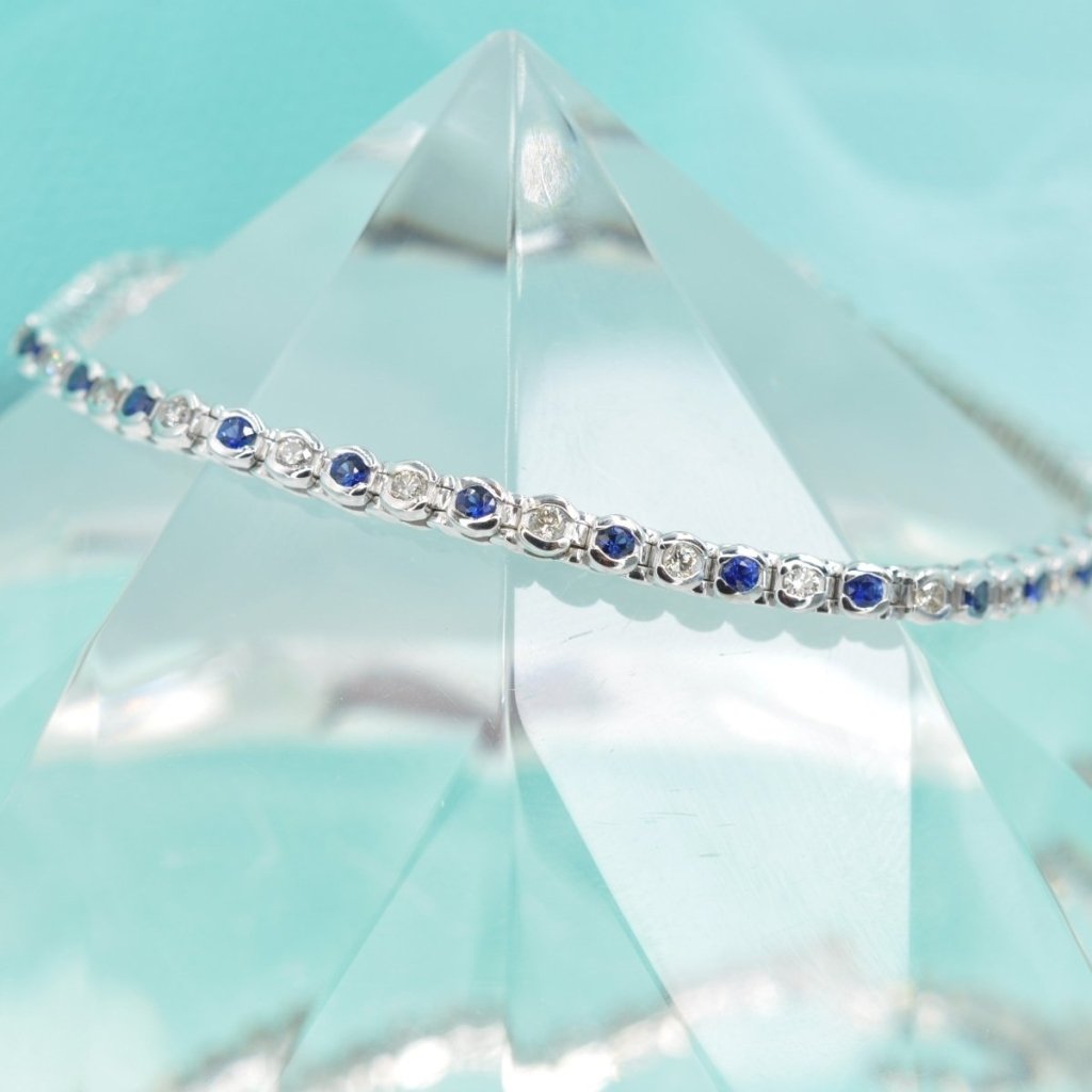 Enchanting 1.00 CT Round Cut Blue Sapphire and Diamond Color Stones Bracelet in 14KT White Gold