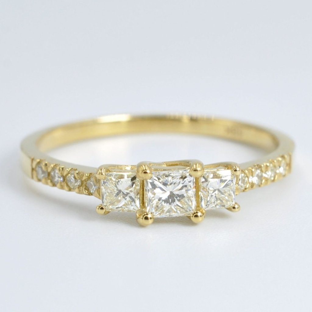 Fashionable 1.10 CT Princess and Round Cut Diamond Three Stone Ring in 18 KT Yellow Gold