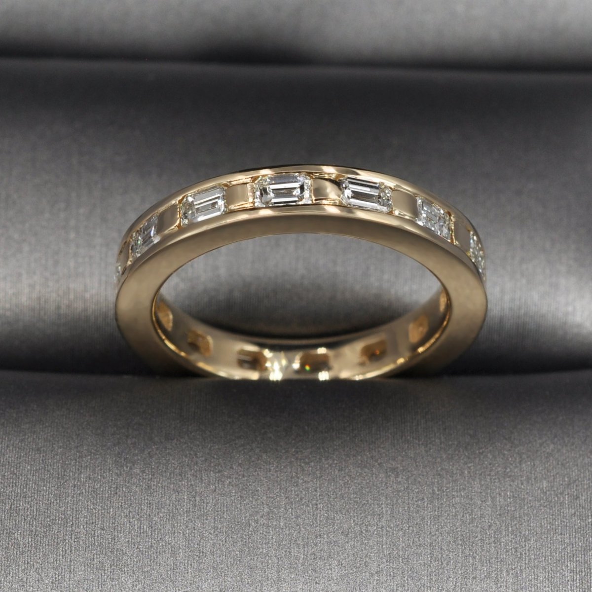 Stunning 2.50 CT Emerald Cut Diamond Eternity Ring in 14KT Yellow Gold