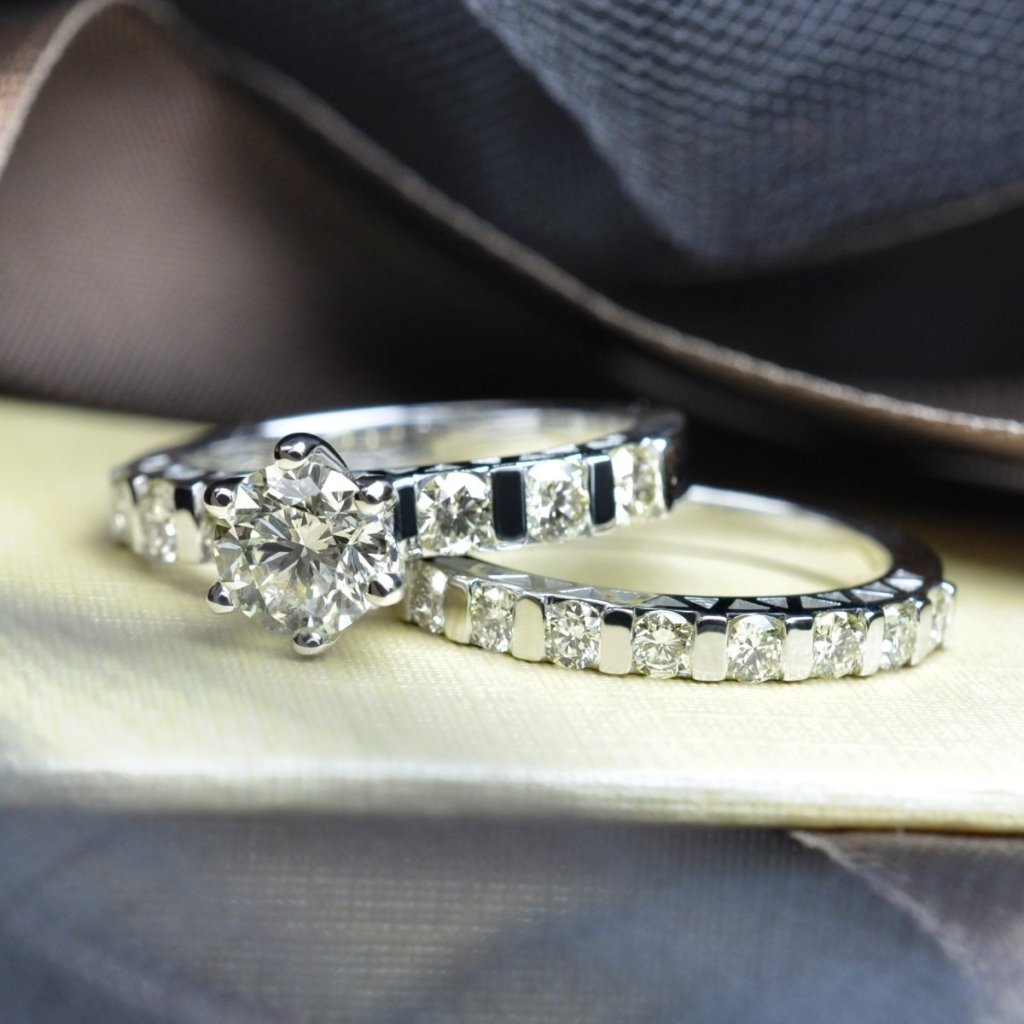 Matching engagement ring and wedding band bridal set in white gold