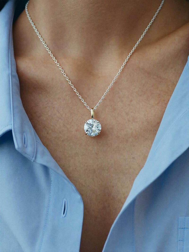 Solitaire diamond pendant on a fine chain