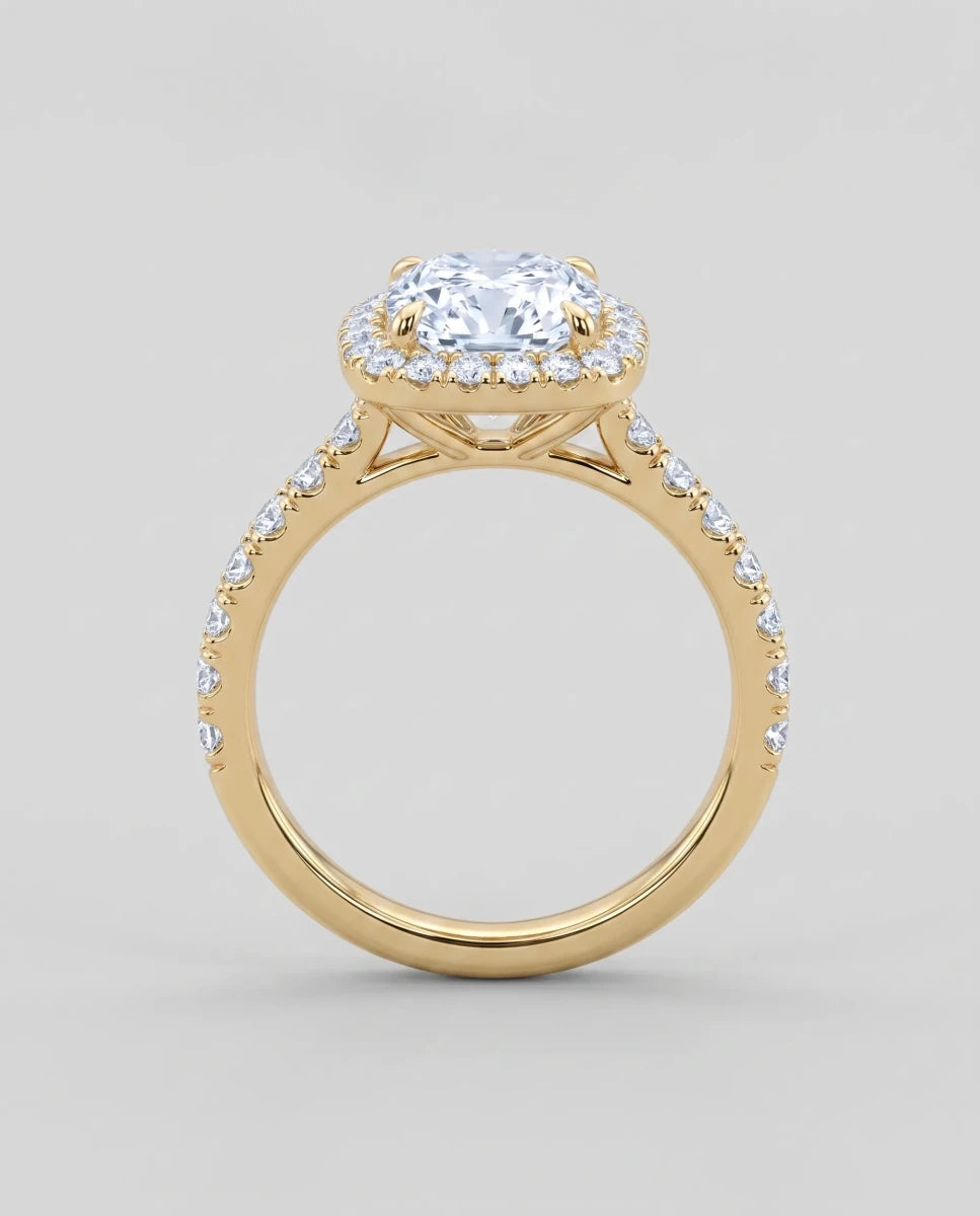 Design render of the cushion halo ring in yellow gold