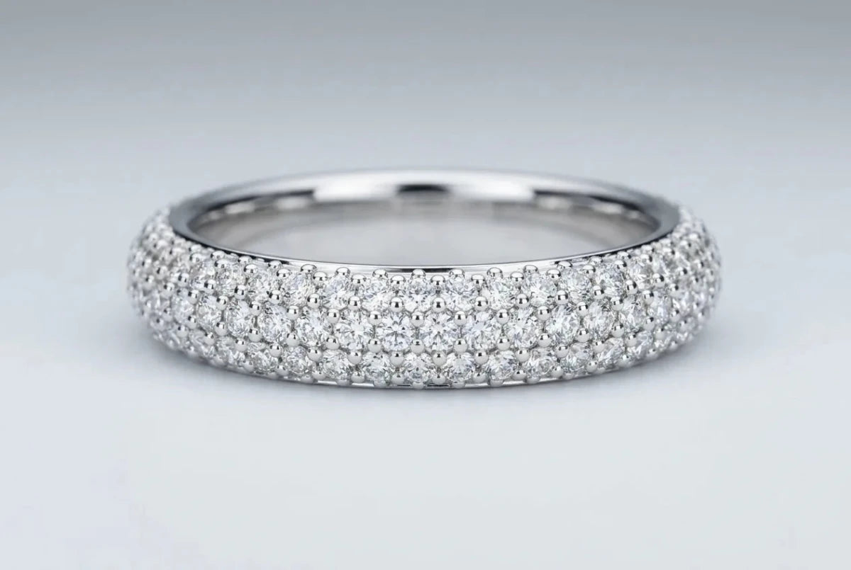Pavé band paved with many tiny diamonds set closely together