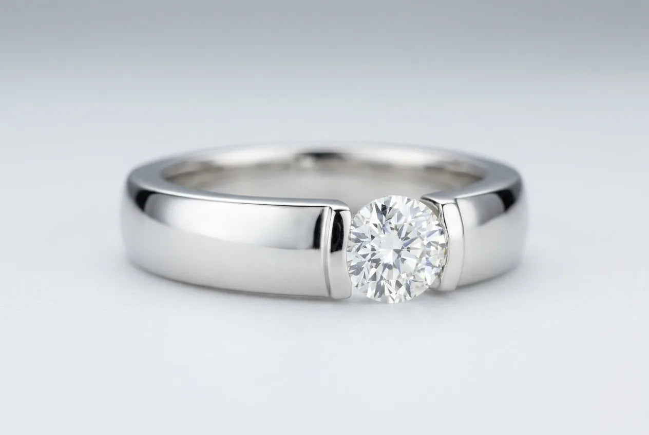 Tension-set ring with the diamond suspended between the two ends of the band