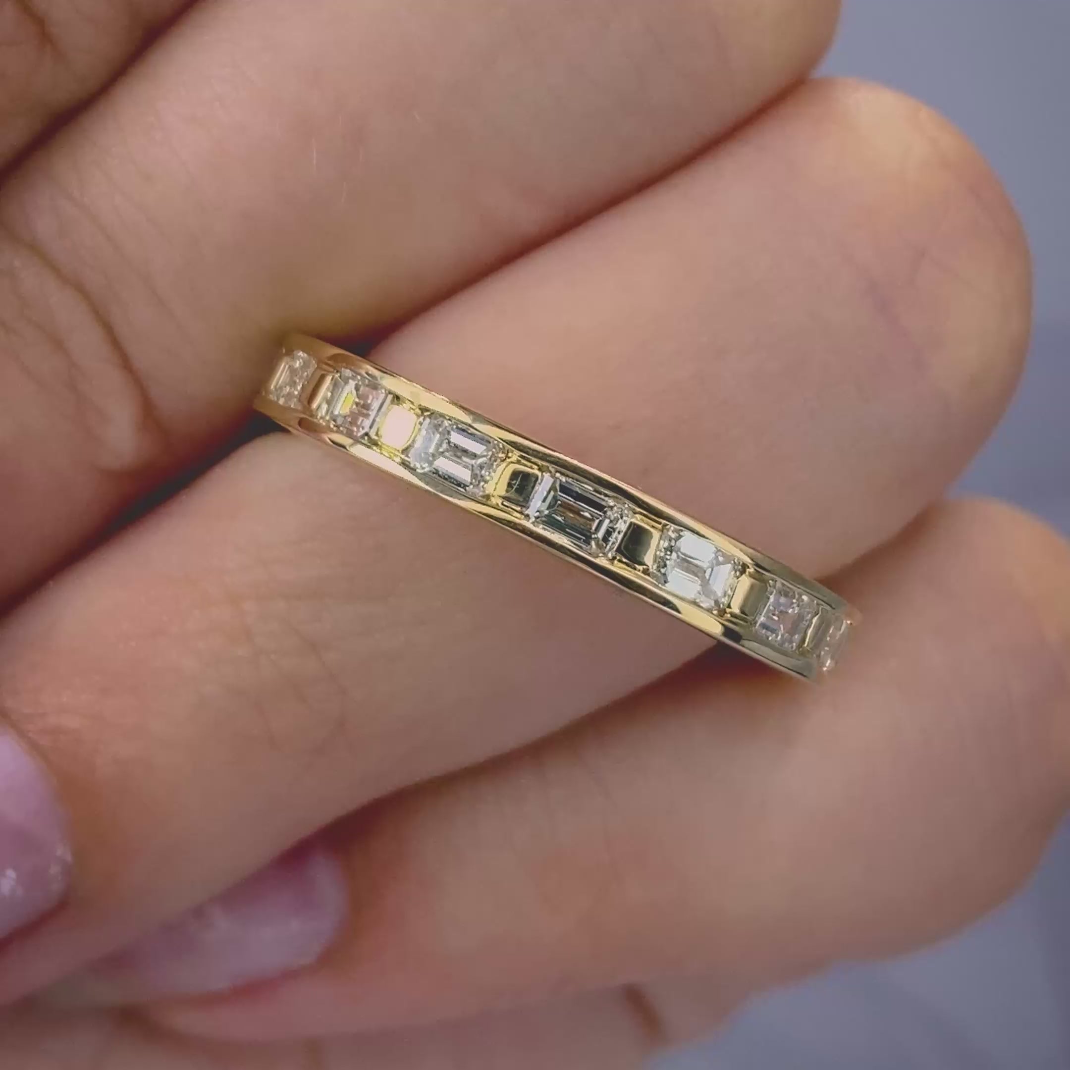Stunning 2.50 CT Emerald Cut Diamond Eternity Ring in 14KT Yellow Gold