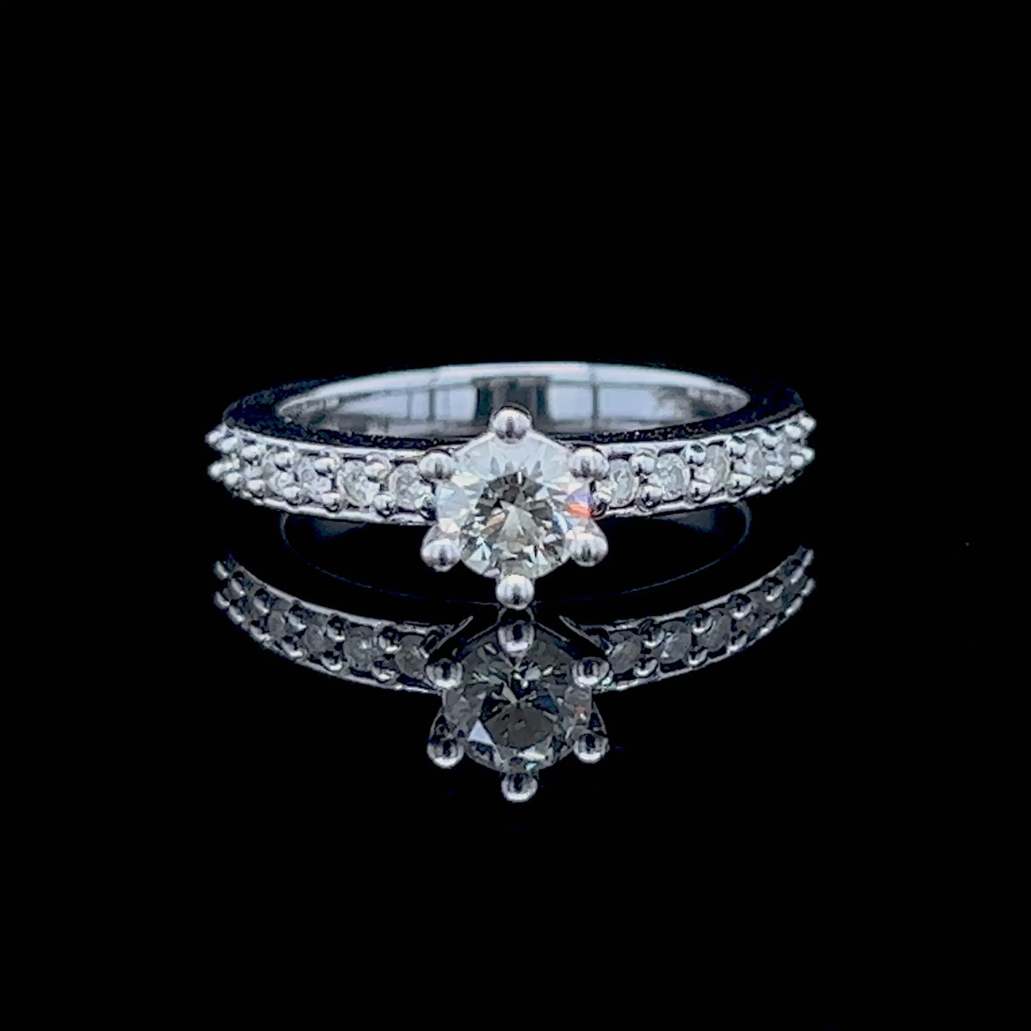 Cost-Effective 0.70 CT Round Cut Diamond Engagement Ring in 14 KT White Gold
