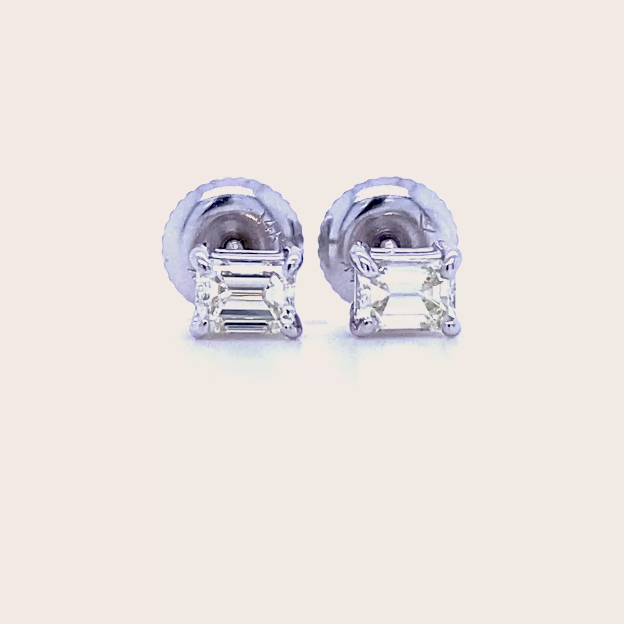 Modern 0.50 CT Emerald Cut Diamond Stud Earrings in 14 KT White Gold