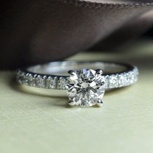 Distinctive 0.95 CT Round Cut Diamond Engagement Ring in 14KT White Gold