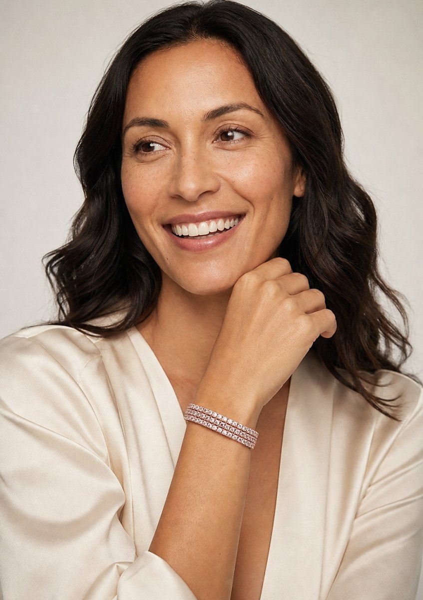 A woman wearing a rose gold diamond bracelet
