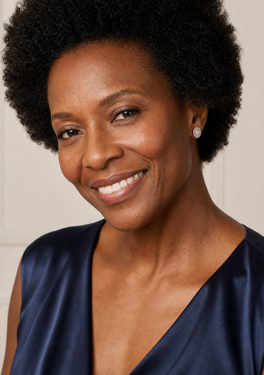 A woman wearing a rose gold diamond pair
