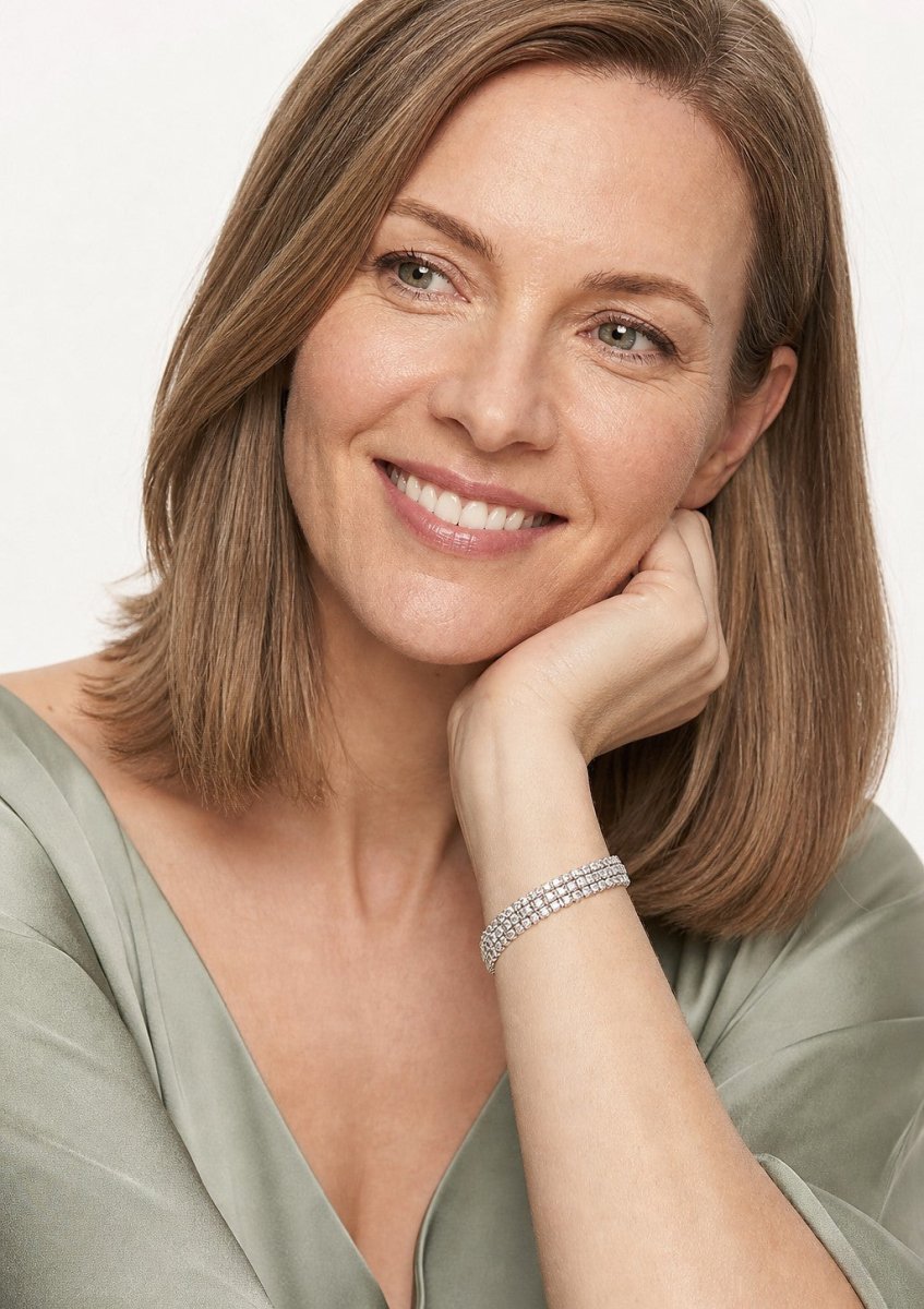 A woman wearing a white gold diamond bracelet