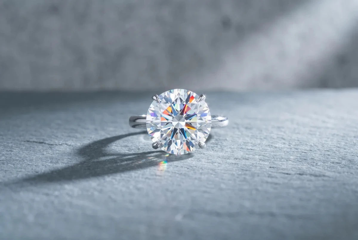 A round brilliant diamond throwing spectral flashes of color out of its facets