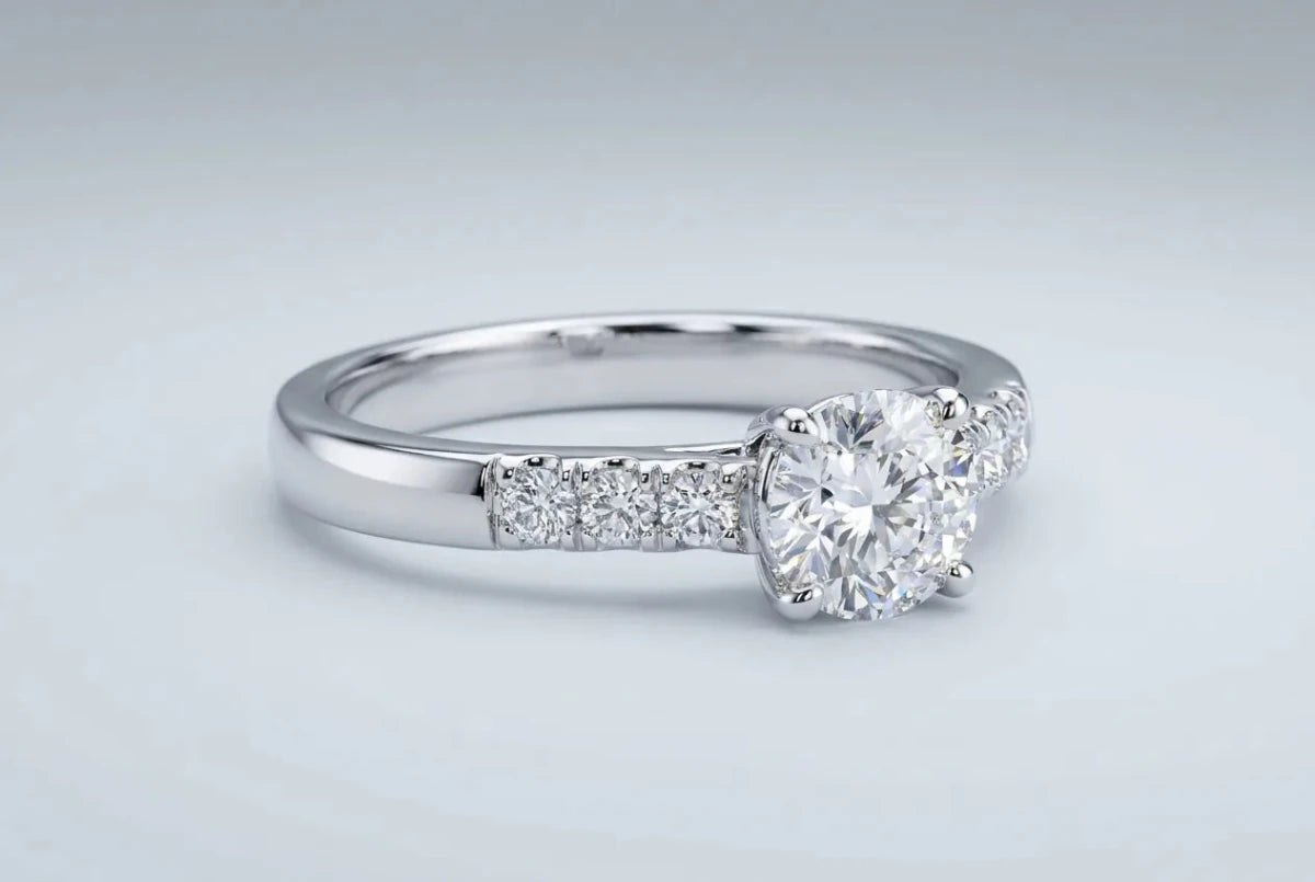 A polished white gold diamond ring with a bright mirror finish