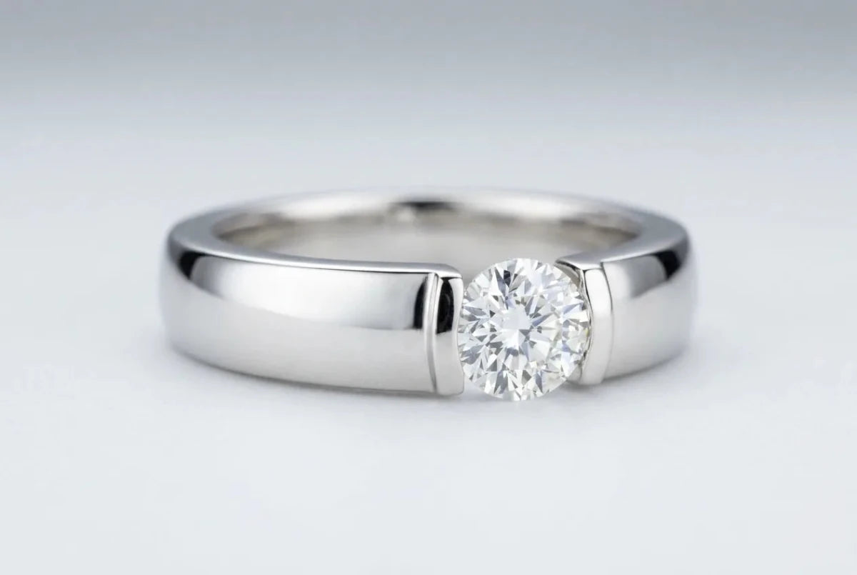 Tension-set ring with the diamond suspended between the two ends of the band