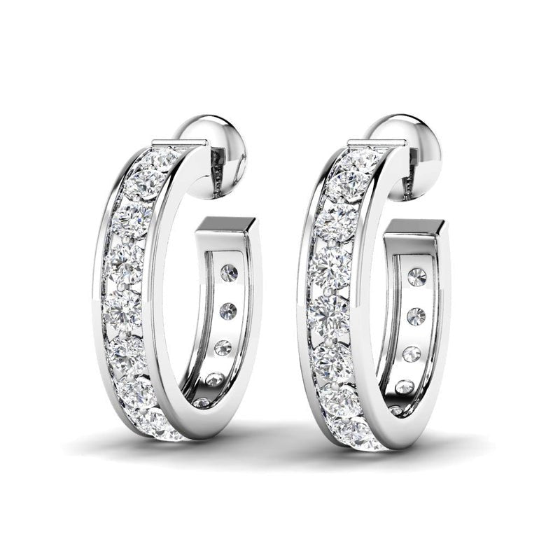 A pair of channel-set diamond hoop earrings in white gold