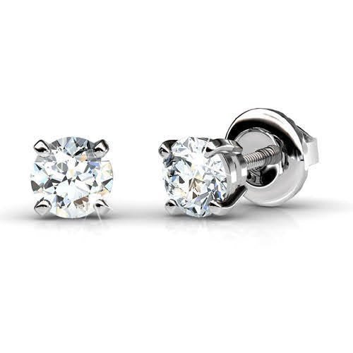 A pair of round diamond stud earrings in white gold