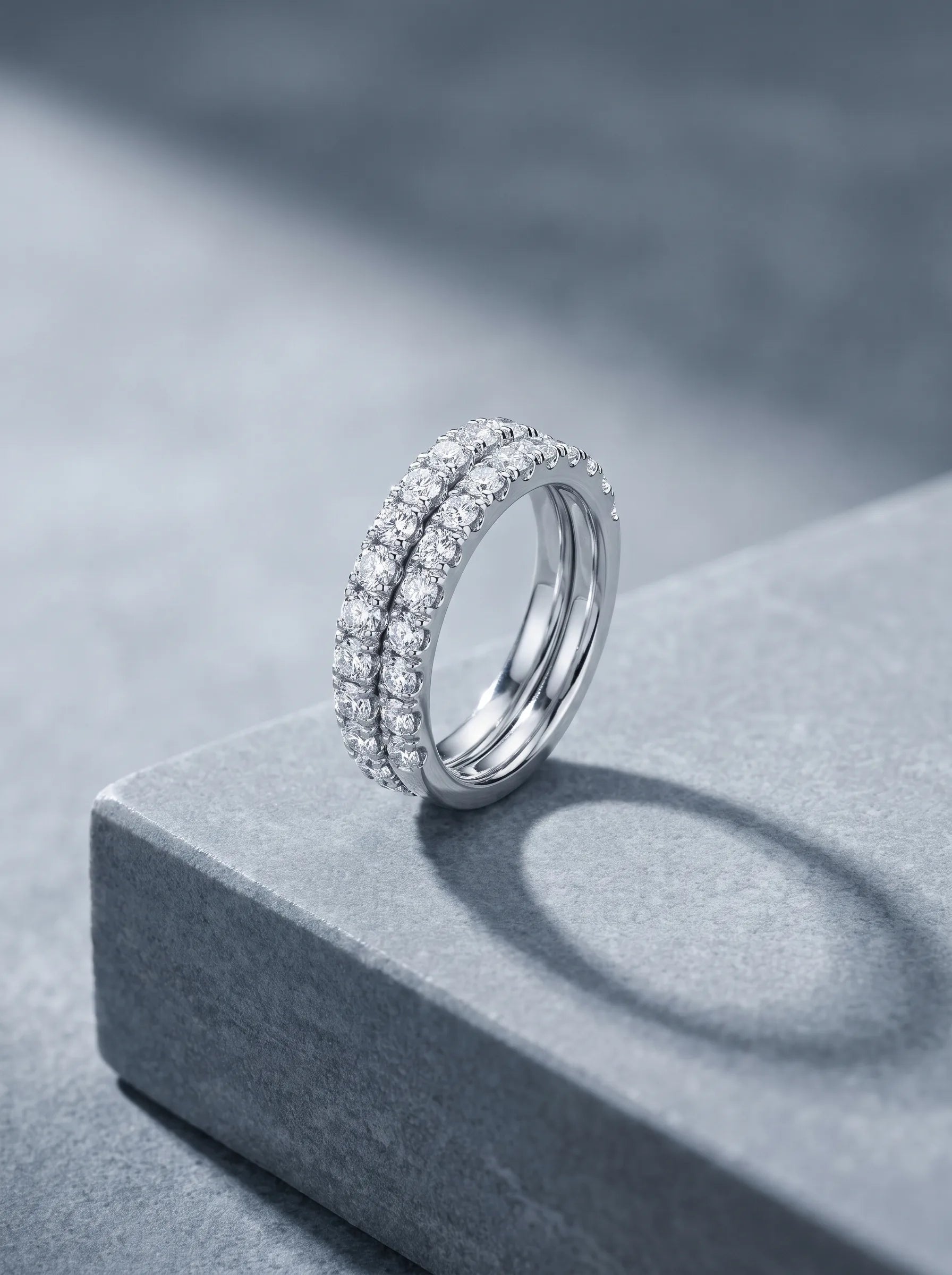 Two custom diamond bands stacked flush together in white gold